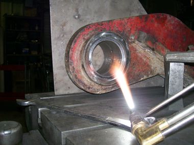 Field Machining — Welding Automotive Part in a Car Factory in Davenport, IA