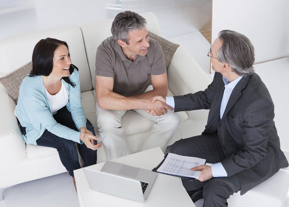 Tax Consultant Shaking Hands With The Clients — Gulfport, MS — MJD & Associates, LLC