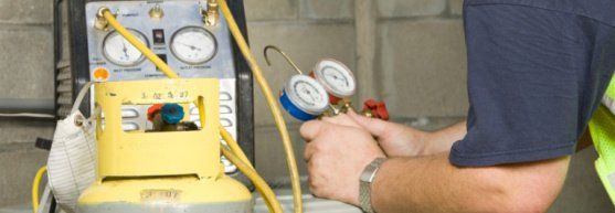 Man Holding Air Gauge — Florida — Air Duct Aseptics