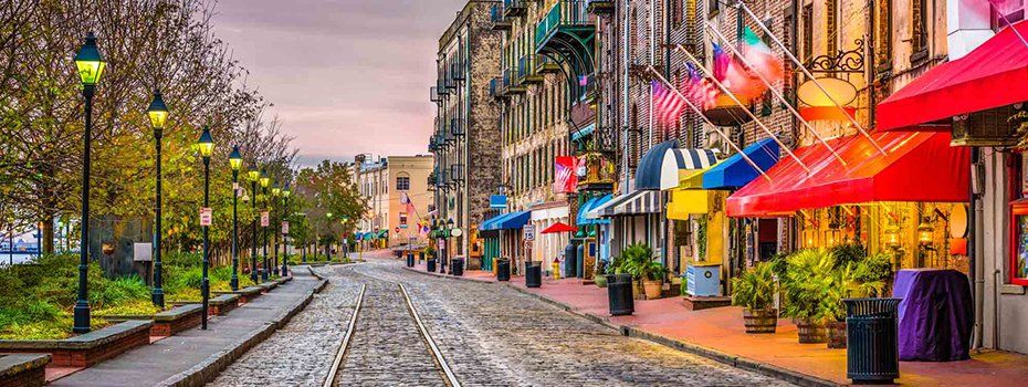 Railroad track with businesses alongside