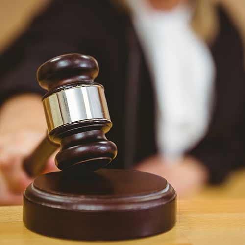 Judge Holding Gavel — Eau Claire, WI — Cohen Law Offices