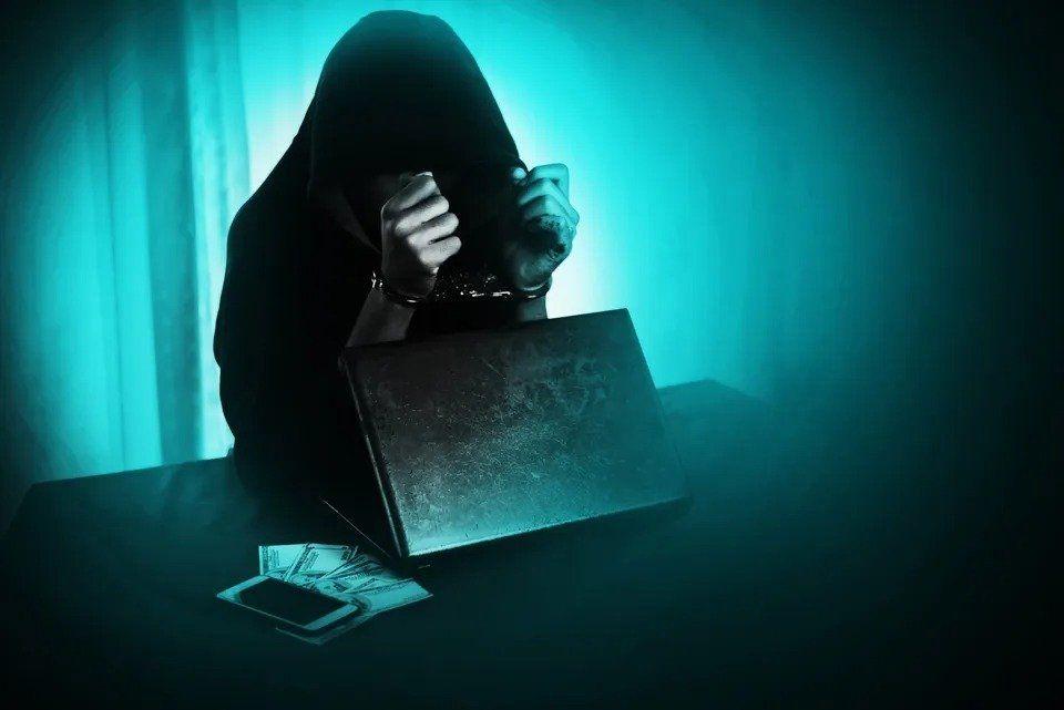 Cyber Criminal Handcuffed — Eau Claire, WI — Cohen Law Offices Cyber Criminal Handcuffed — Eau Claire, WI — Cohen Law Offices