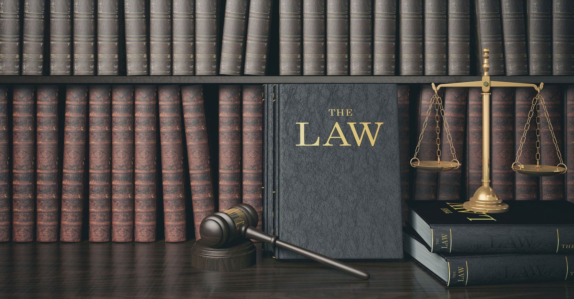 Law Book and Gavel in Library — Eau Claire, WI — Cohen Law Offices Law Book and Gavel in Library — Eau Claire, WI — Cohen Law Offices