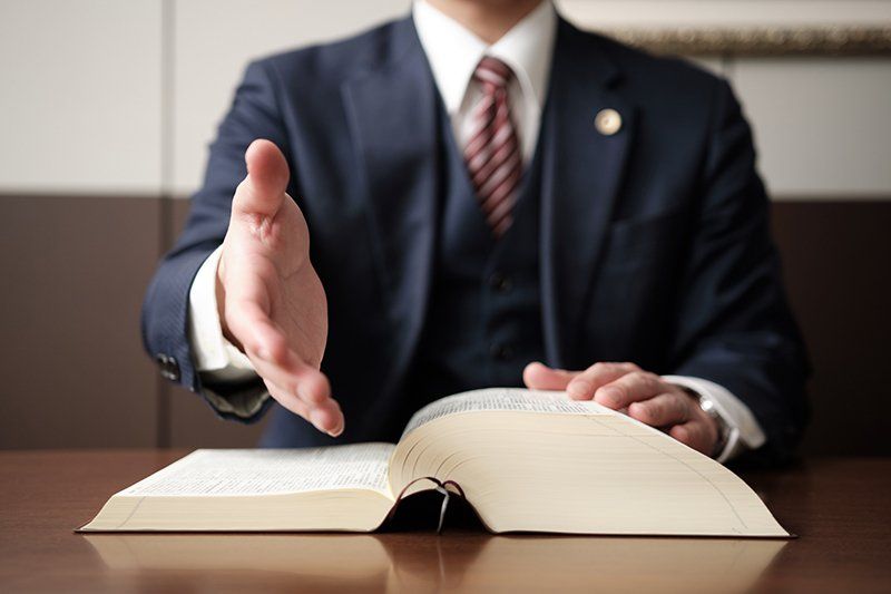 Lawyer Reaching Out — Eau Claire, WI — Cohen Law Offices Lawyer Reaching Out — Eau Claire, WI — Cohen Law Offices