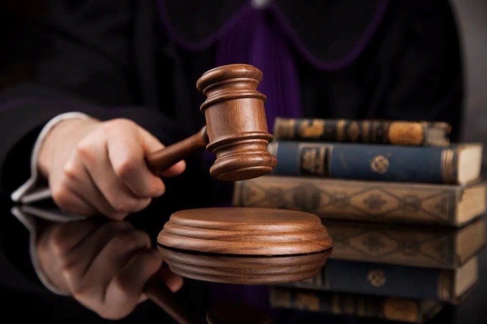 Holding Gavel — Eau Claire, WI — Cohen Law Offices, LLC Holding Gavel — Eau Claire, WI — Cohen Law Offices, LLC