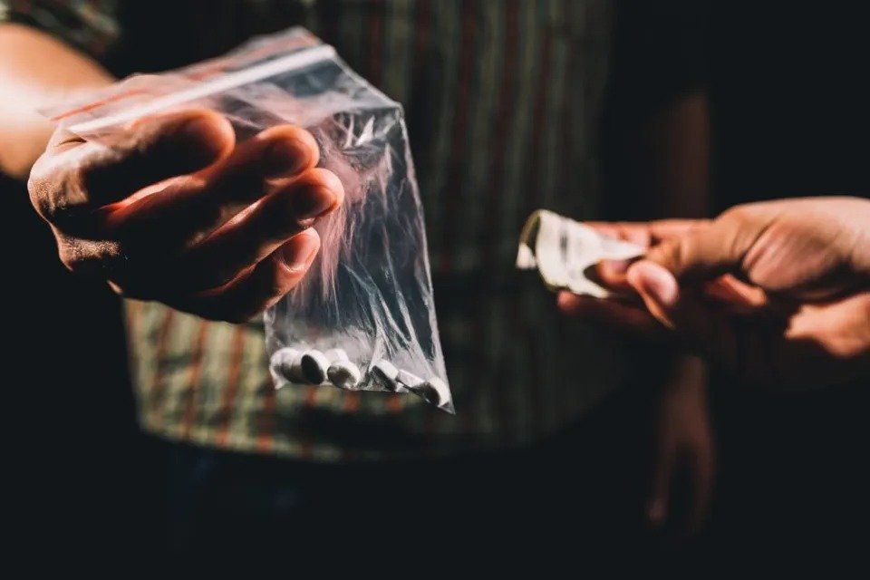 Person Dealing Illegal Drugs — Eau Claire, WI — Cohen Law Offices Person Dealing Illegal Drugs — Eau Claire, WI — Cohen Law Offices