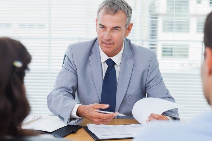 Couple talking with lawyer - Divorce lawyer in Champaign - Urban, IL Couple talking with lawyer - Divorce lawyer in Champaign - Urban, IL
