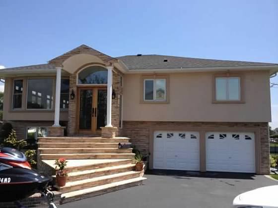 Two Story Home with Decorative Entry Stairs - Double Garage