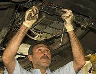 Man working on a car - Power Rite Auto Service in East Northport NY