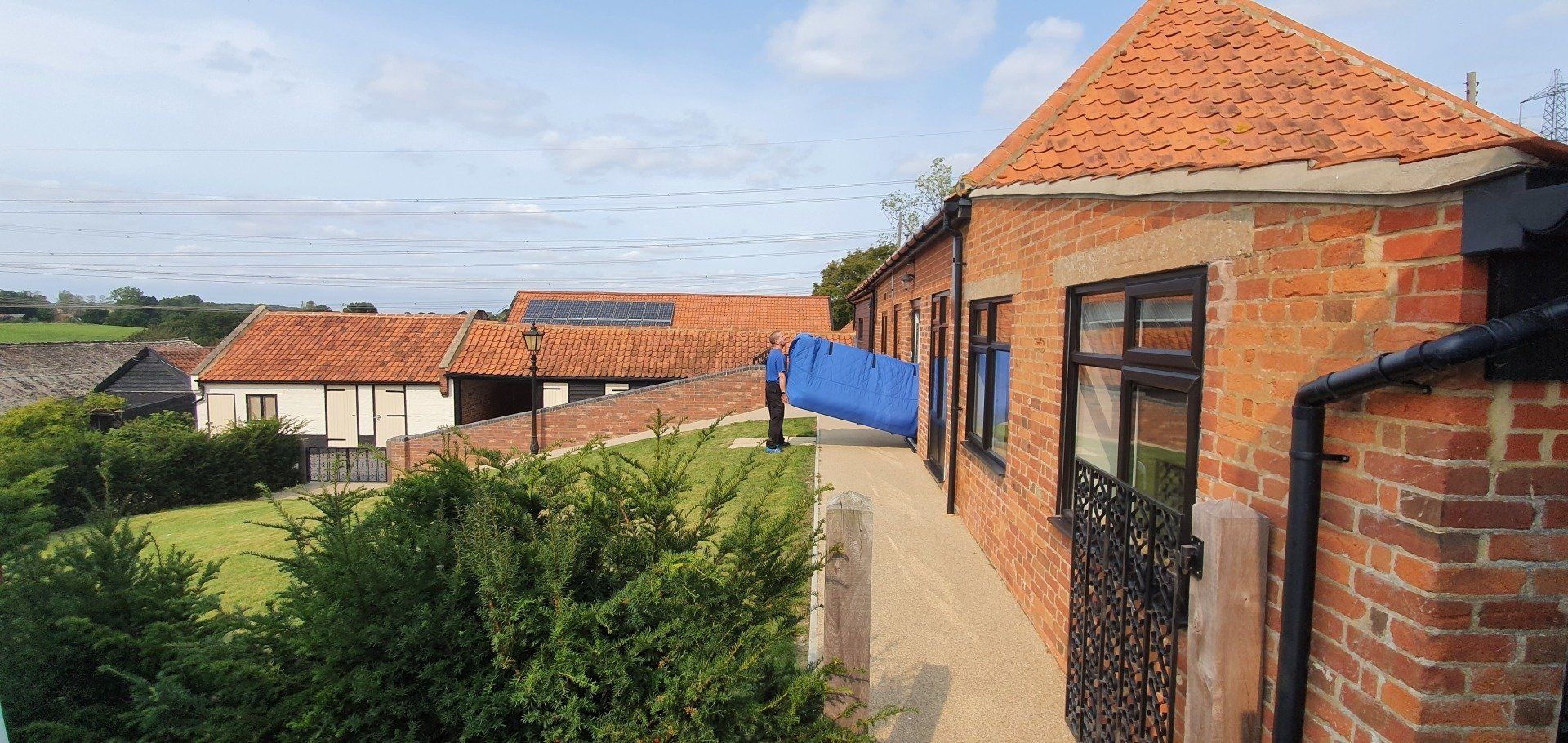 Padded sofa cover in use during a house move in Ipswich Suffolk