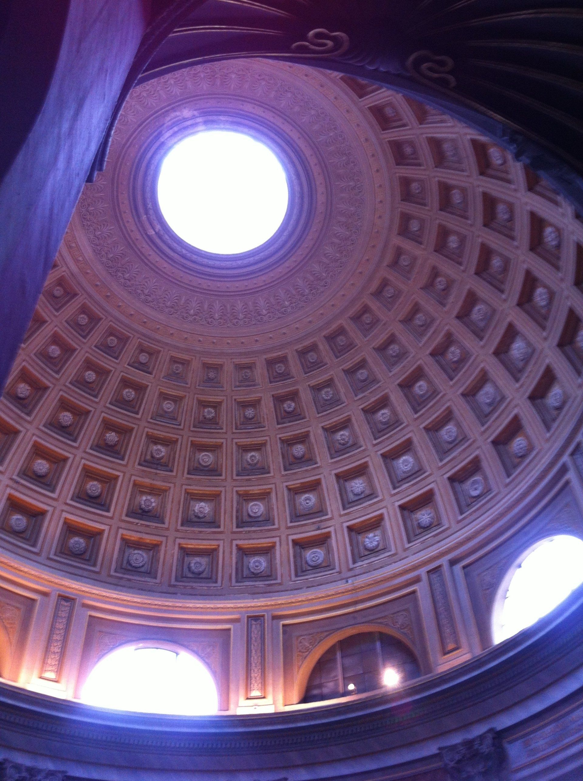Oculus of the Pantheon, Rome, siphons natural light into this marvel of classical antiquity and engineering.