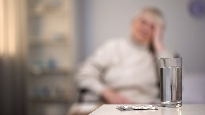 Water and Medicine on Table — Charlotte, NC — McCall Brothers Inc