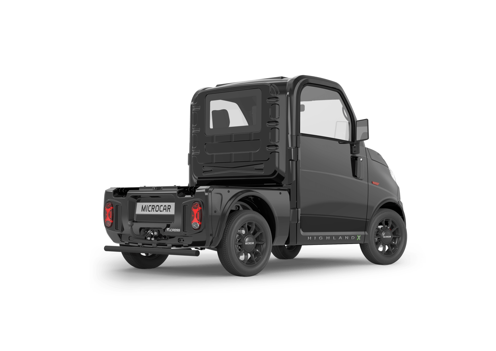 L'arrière d'un petit camion noir sur fond blanc.