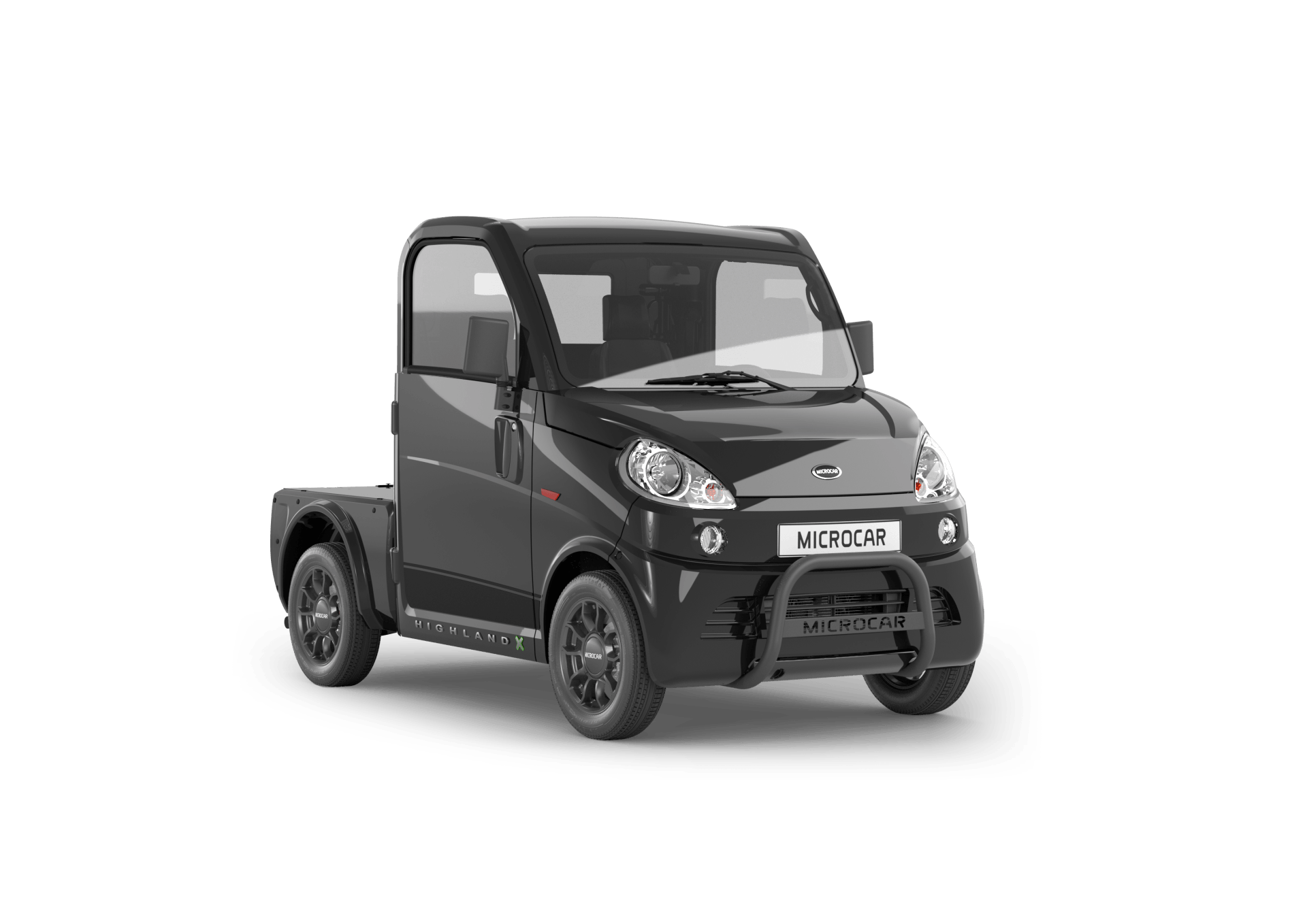 Une photo en noir et blanc d'un petit camion sur fond blanc.
