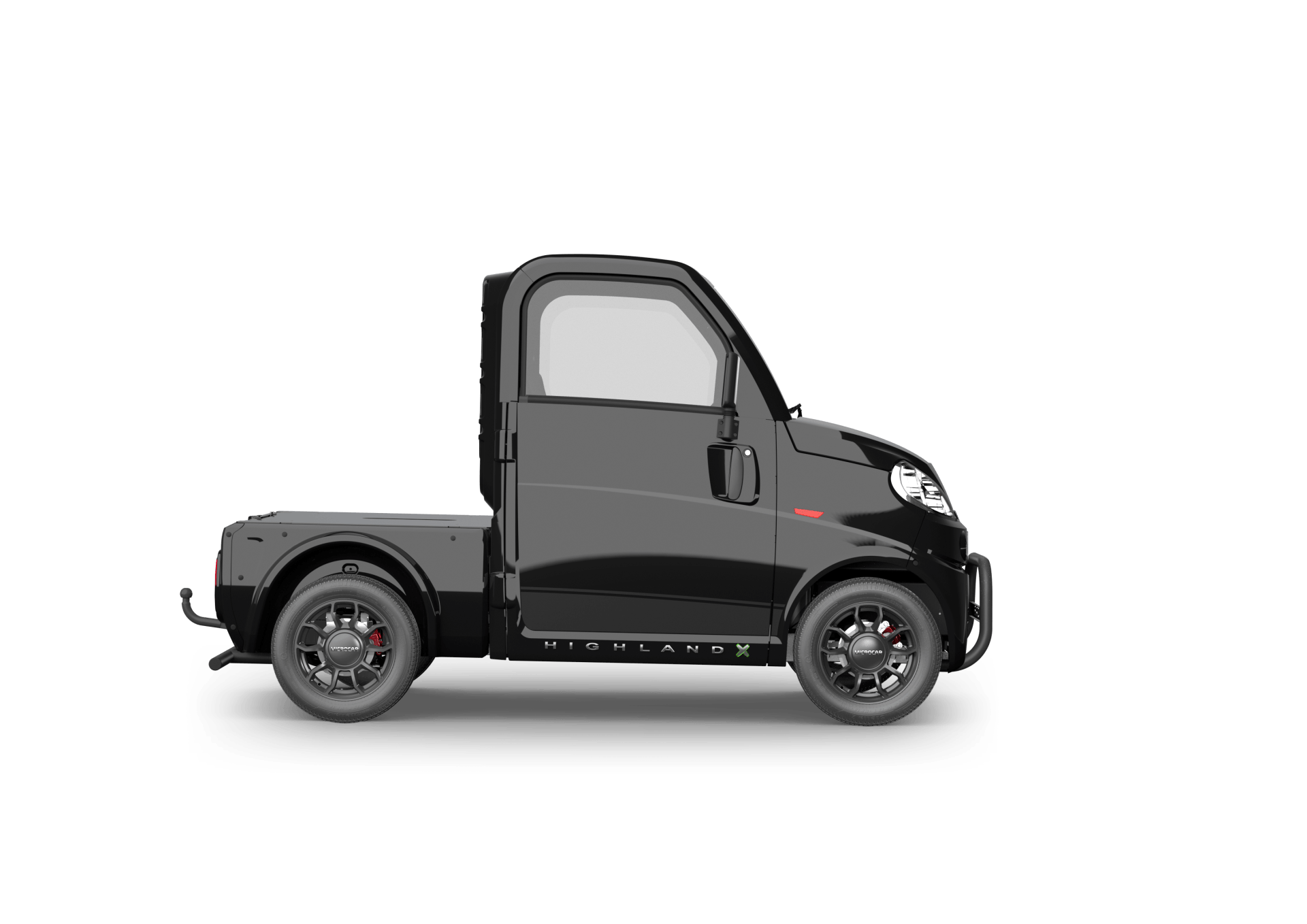 Un petit camion noir est montré de côté sur un fond blanc.