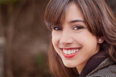 Beautiful Young Woman Smiling — Bridges and Dentures in Reading, MA Beautiful Young Woman Smiling — Bridges and Dentures in Reading, MA