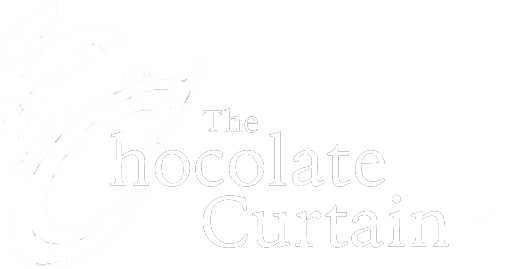 A white logo for the chocolate curtain