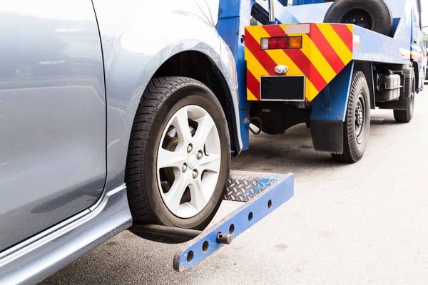 Towing A Broken Down Car — Dearborn, MI — Rusko’s Service Center Towing A Broken Down Car — Dearborn, MI — Rusko’s Service Center