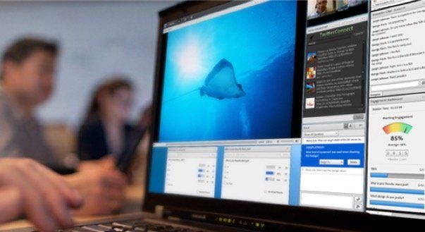A close up of a laptop displaying an interactive webinar platform