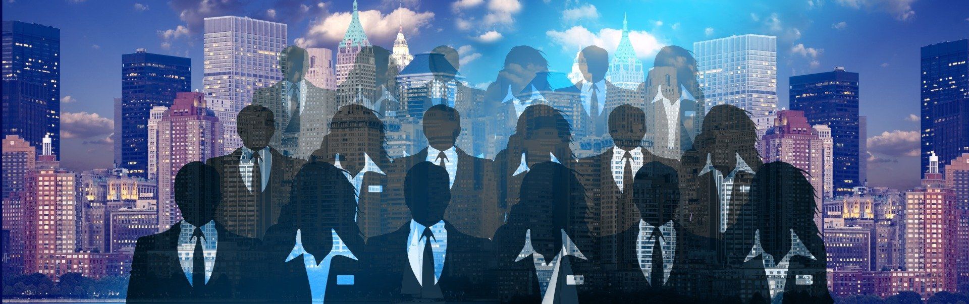 A group of people in suits and ties are standing in front of a city skyline.