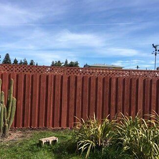 Privacy Fence — Brown Fence with the Sky in the Background in San Leandro, CA