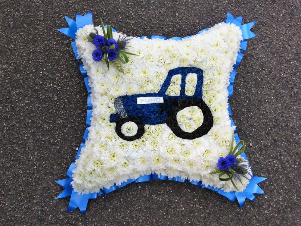 14. 18” Cushion with custom made blue Tractor to the centre, blue ribbon edge, blue Cornflower Posies