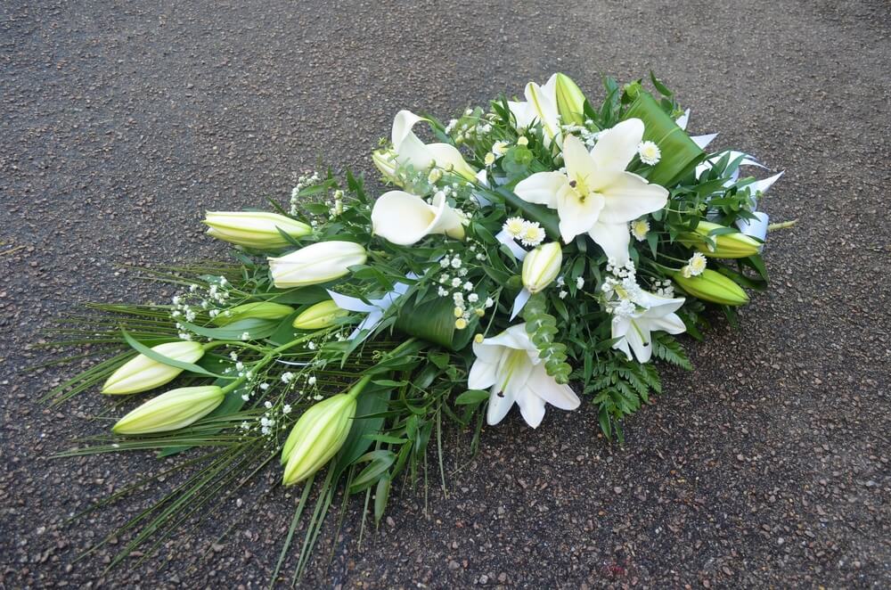 34. Spray of white Oriental and Calla Lily’s
