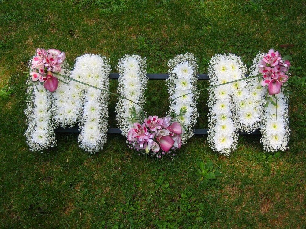 18. Feminine MUM with white letters, pink Calla and Alstromeria posies