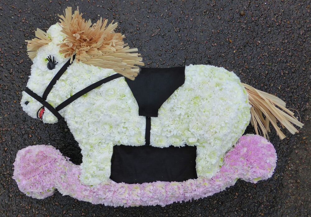 23. Beautiful hand cut Rocking Horse 24” x 18”