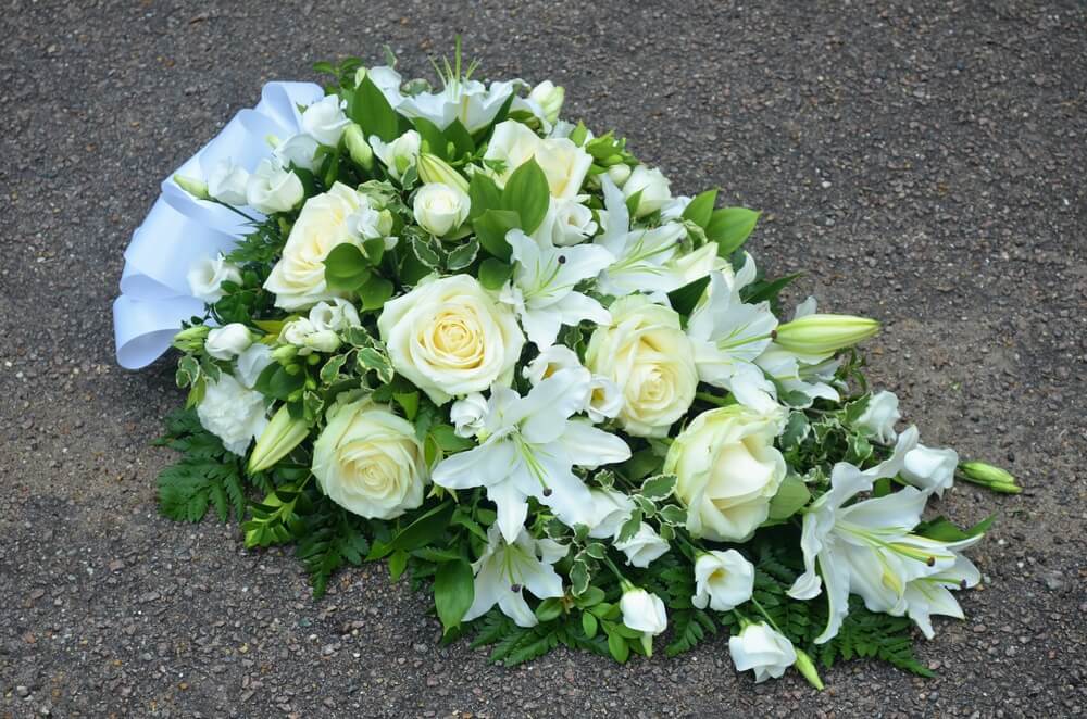 41. Spray of white Roses, Lily’s and Lisianthus