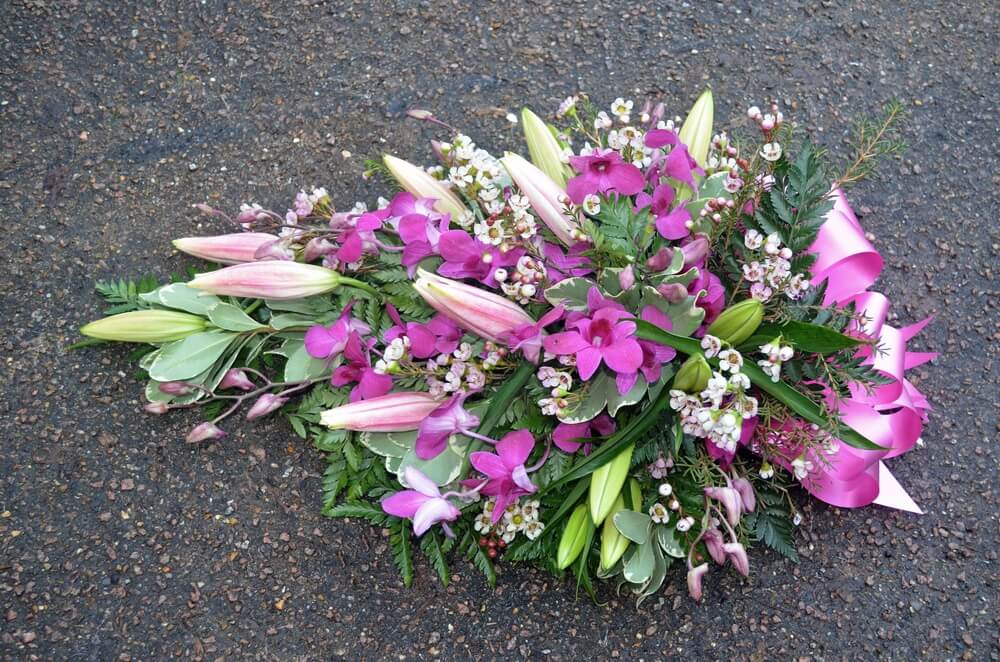 11. Spray of pink Lily’s, Dendrobium Orchids and Waxflowers