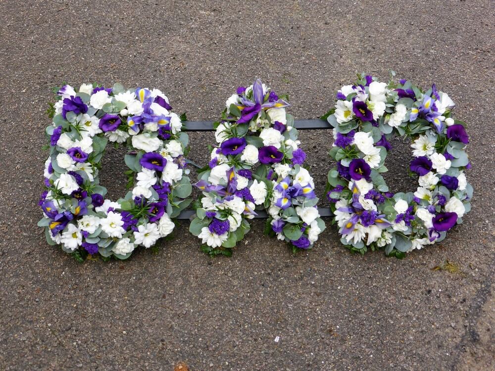 2.  Loose set DAD with purple Lisianthus and Statice. White Dianthus and Chrysanthemums