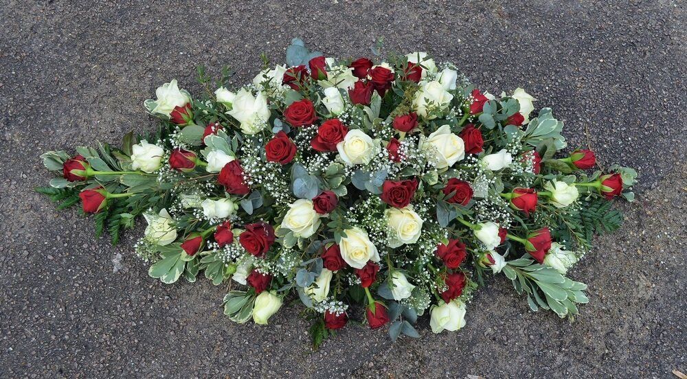 6.   Spray of white and red Roses.