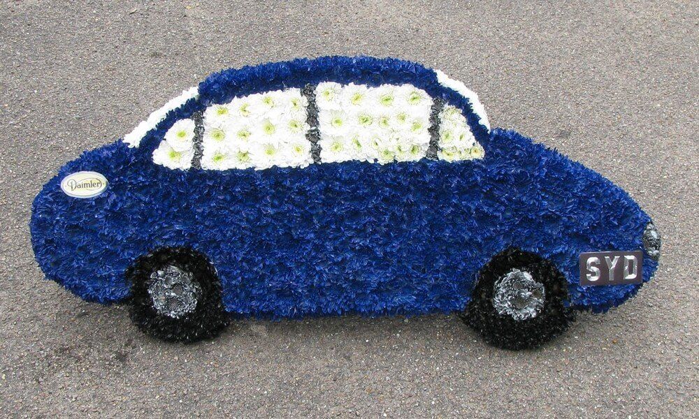 54. Hand cut Saloon car 3’6” long, personalised as requested