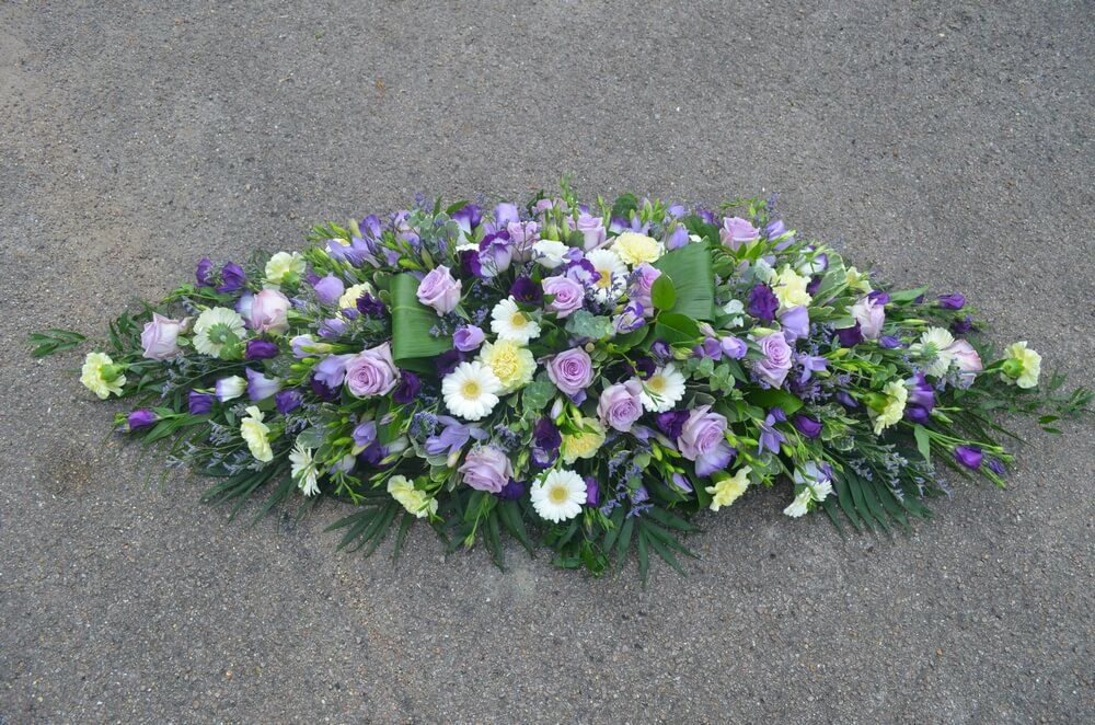 45. Beautiful spray with lilac Roses, Limonium and Freesias, purple Lisianthus, ivory Germini and cream Carnations