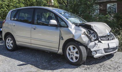 a silver car that met with an accident