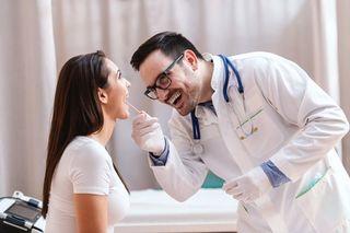 Doctor Taking Saliva Test — Omaha, NE — Arbor Heights Family Medicine Doctor Taking Saliva Test — Omaha, NE — Arbor Heights Family Medicine