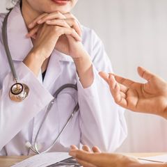 Female Doctor Listening to Depressed Patient — Omaha, NE — Arbor Heights Family Medicine Female Doctor Listening to Depressed Patient — Omaha, NE — Arbor Heights Family Medicine