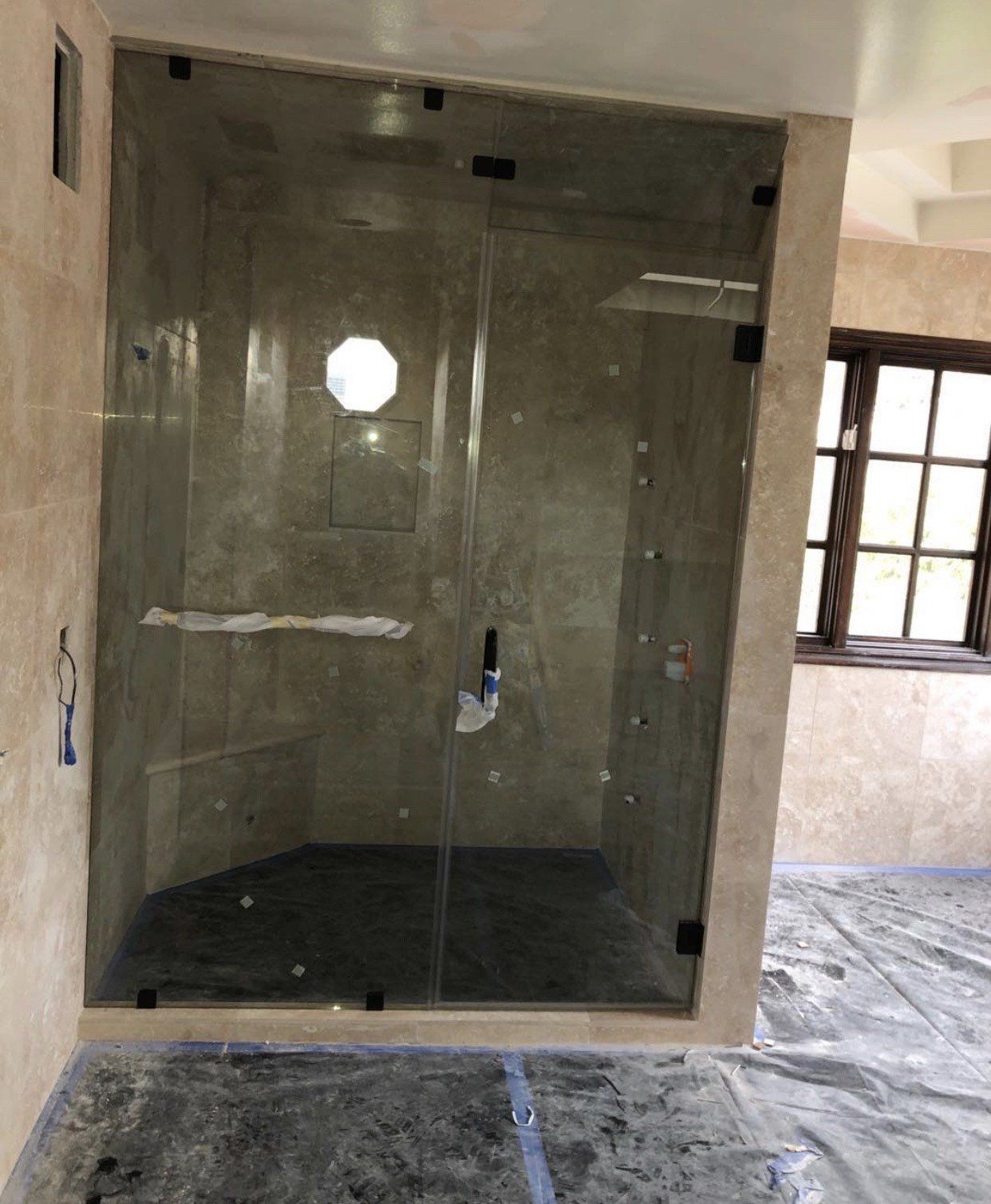 Installing a Glass Shower Door — Pasadena, CA — A & S Glass and Mirrors