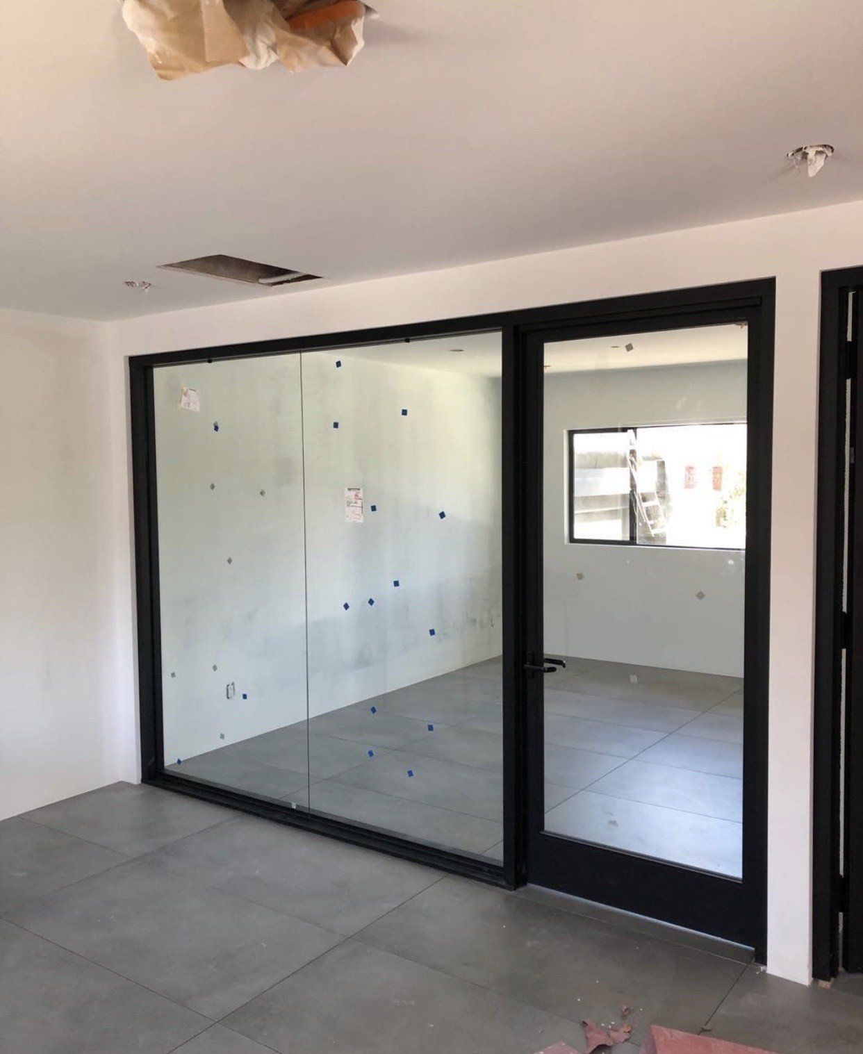 Glass Door on an Empty Room — Pasadena, CA — A & S Glass and Mirrors
