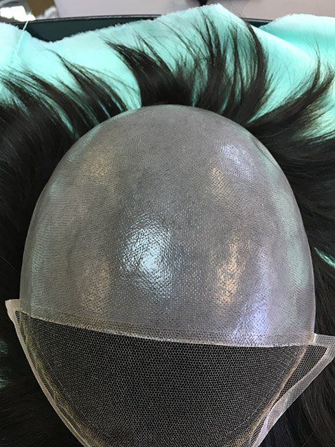 Hair replacement fitting and techniques