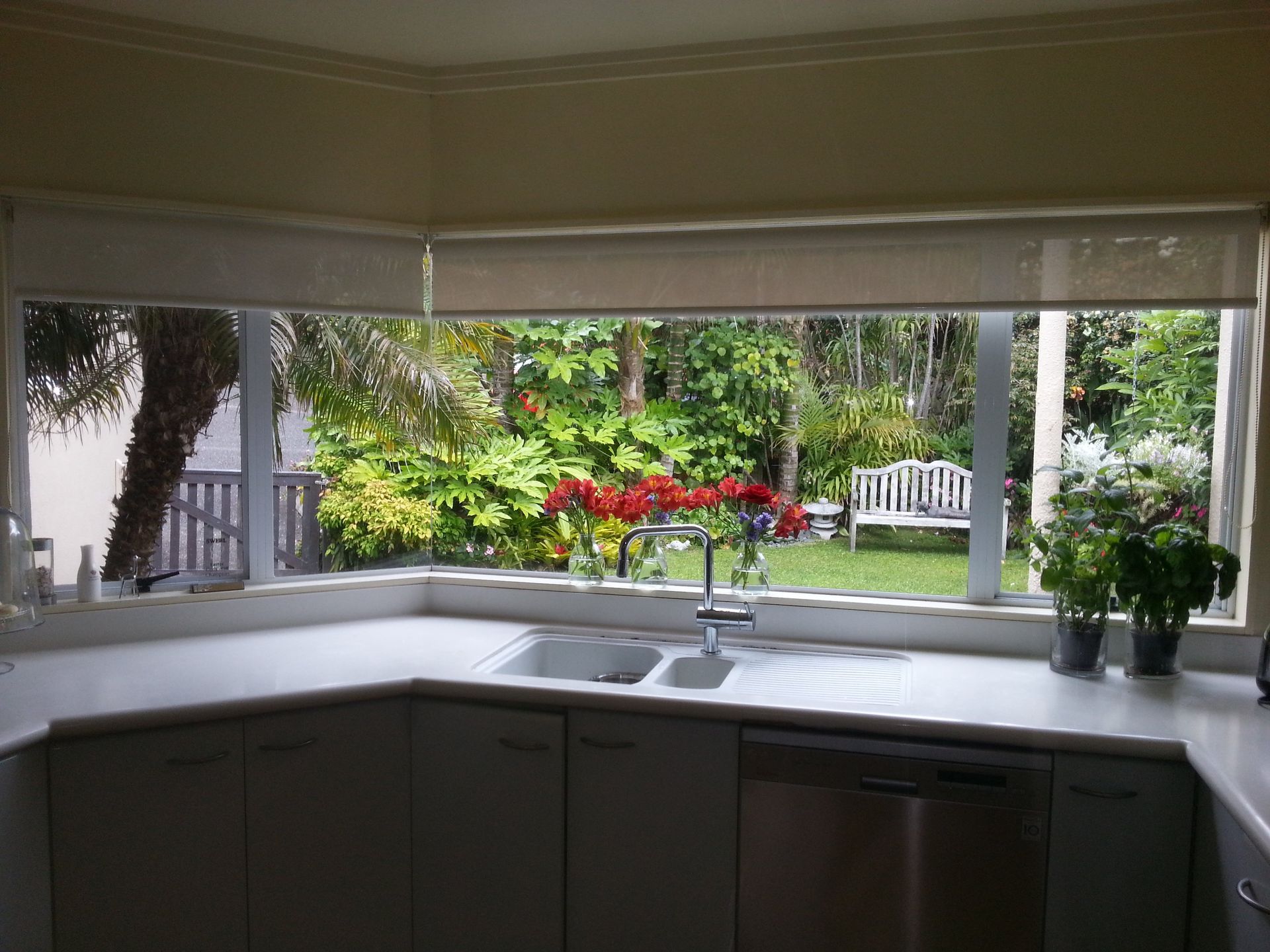 cream window blinds with sky in background