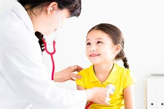 North Carolina — Child Smiling While Being Treated in Asheville, NC North Carolina — Child Smiling While Being Treated in Asheville, NC
