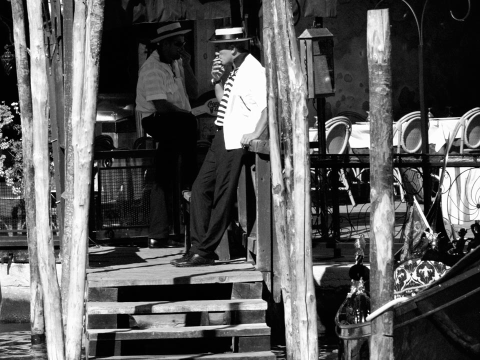 A black and white photo of two men shaking hands