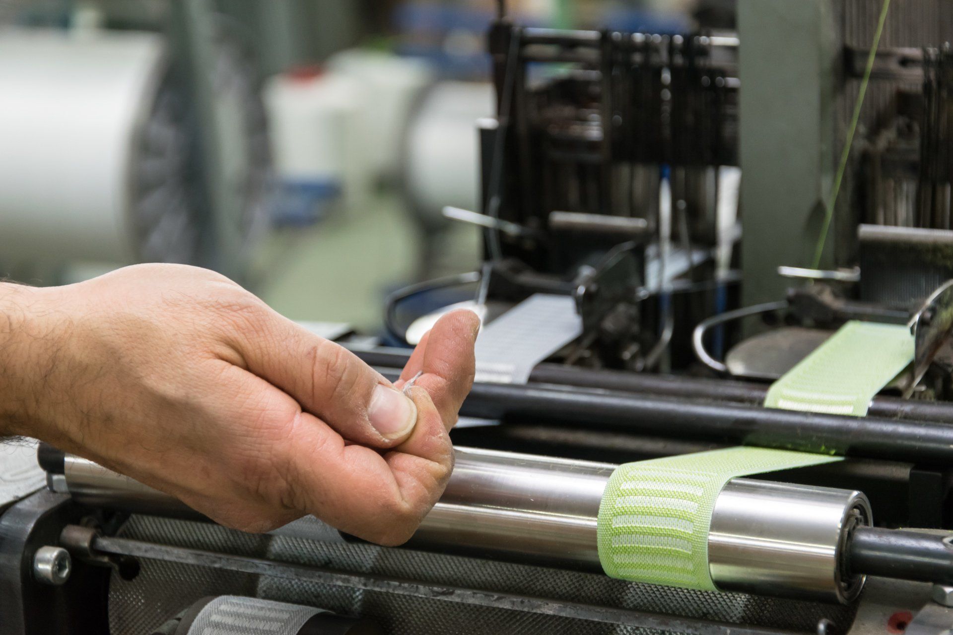 hand placing the nylon in the machine