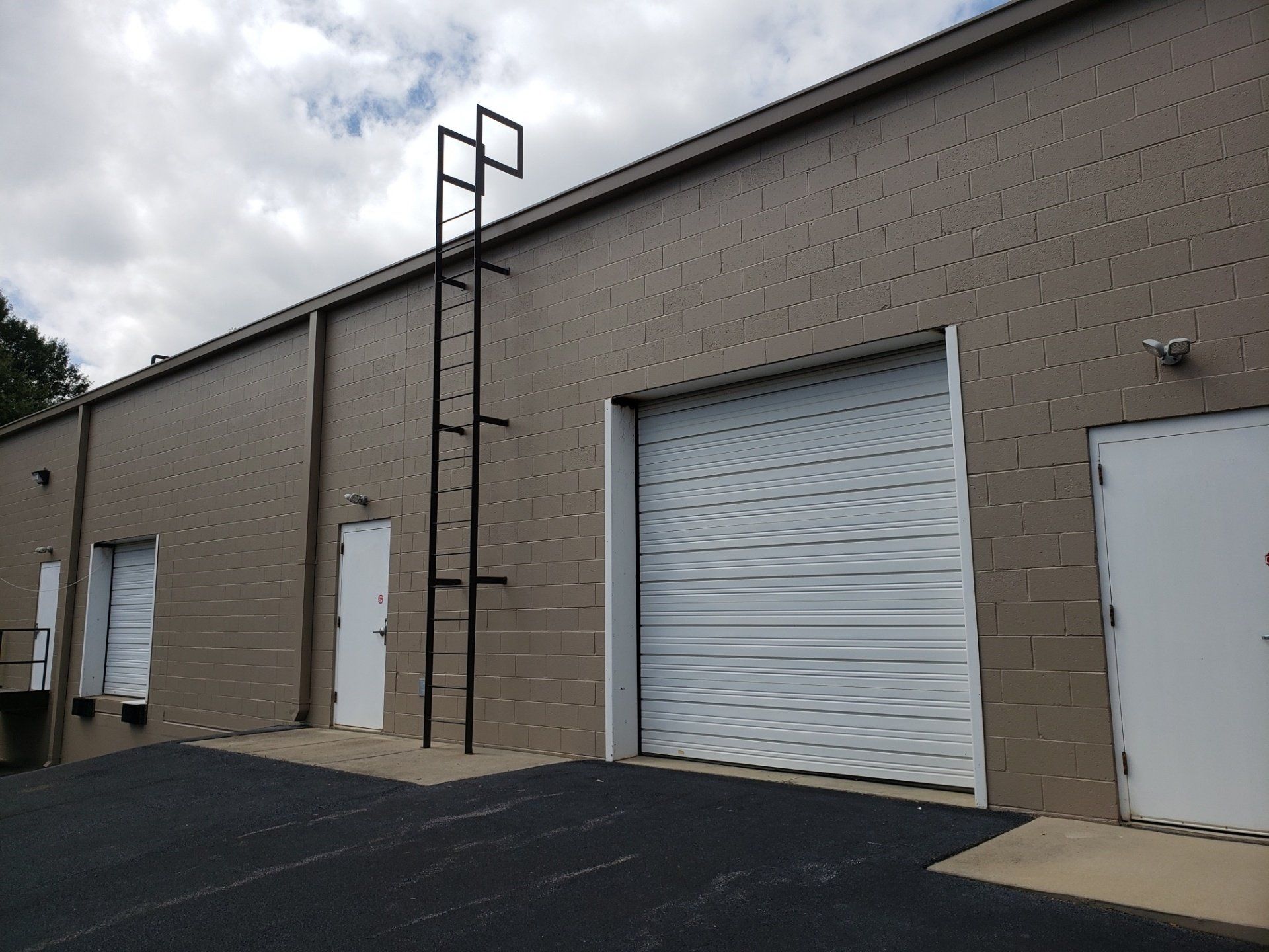 a building with a ladder on the side of it