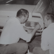 Two People Checking Car — Montrose, CO — Mylar's Auto Refinishing Service