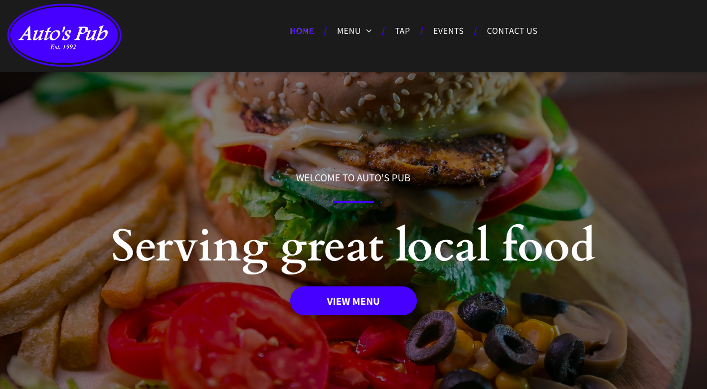 A hamburger and french fries on a plate with the words `` serving great local food ''.