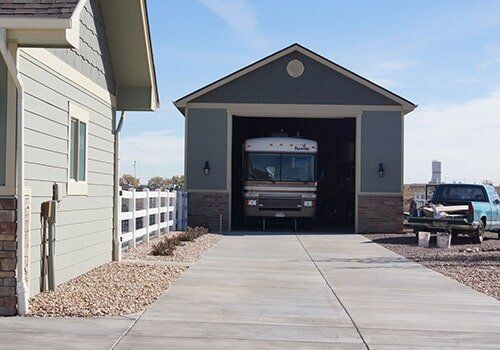 Vehicle inside garage — Garage Construction Services in the Denver Metro Area