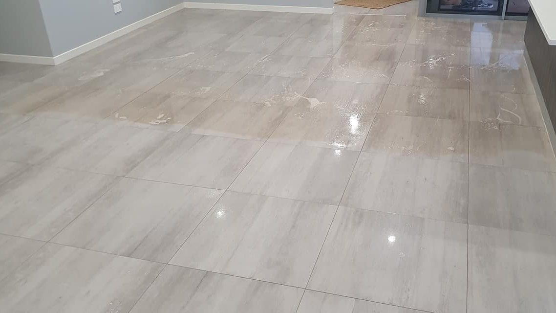 Porcelain Tile and Grout Clean Porcelain Tile and grout cleaned with alkaline cleaner and extracted